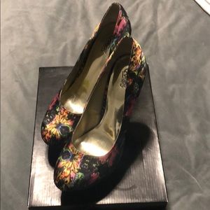 Carlos Santana heels